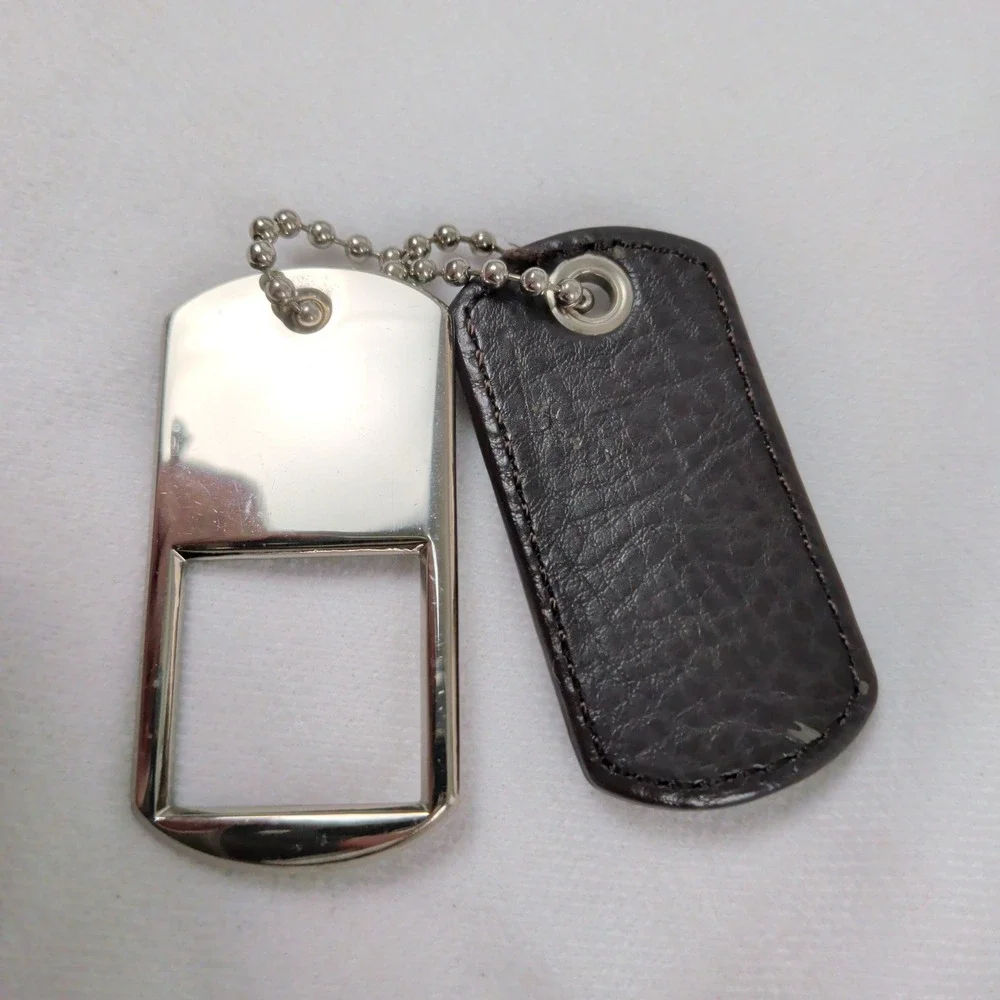 Tignanello Silver Tone Metal and Brown Leather Dog Tag Purse Charm Keychain